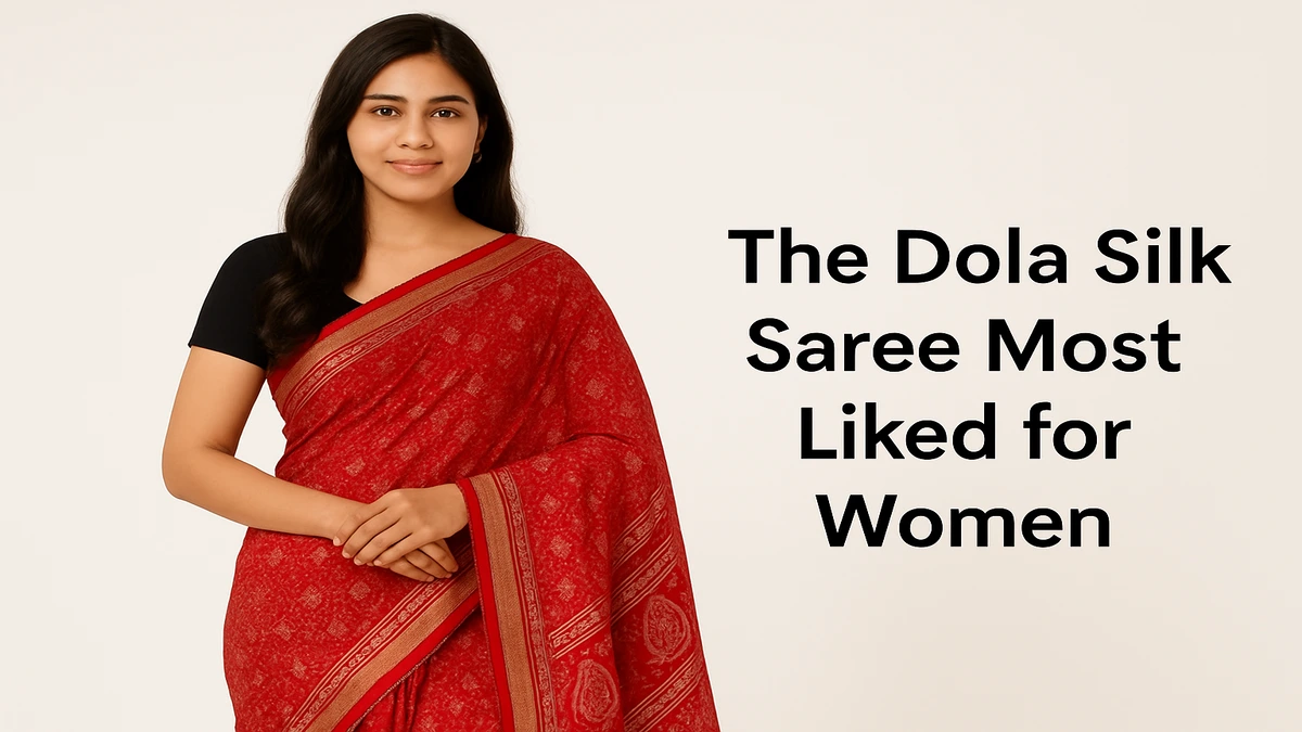 A graceful Indian woman draped in a luxurious maroon Dola Silk Saree with a beautifully woven zari border and intricate floral patterns. The saree’s smooth texture and elegant fall highlight its premium silk fabric, making it ideal for festive occasions, weddings, and cultural celebrations. Styled with traditional jewelry and a matching blouse piece, the look captures timeless ethnic charm blended with modern grace.